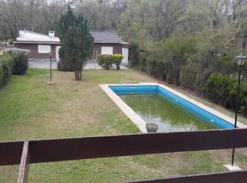 Casa · 550m² · 8 Ambientes · 7 Cocheras · Vendo Complejo de 7 Cabañas en Los Reartes!
