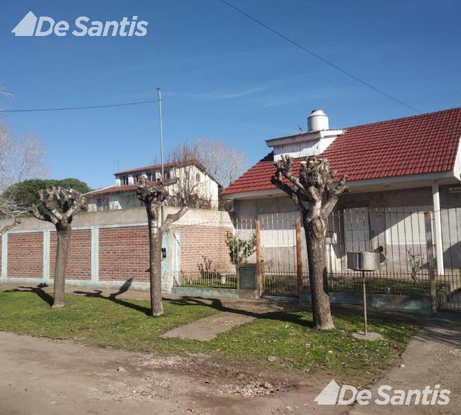 Lote de tereno con paredón perimetral y construcción de 32m²