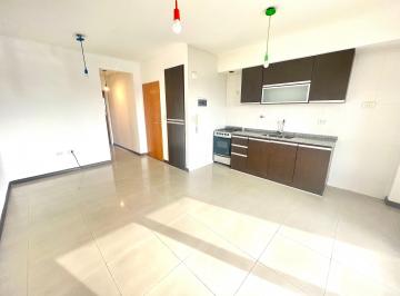 Cocina-comedor · Departamento de 2 Amb. con Cochera y Parrilla en Venta