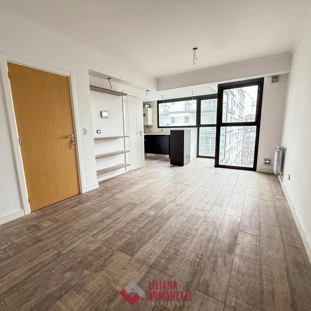 2 Ambientes a Estrenar. Guemes. Amplio living comedor. Cocina con barra desayunadora.