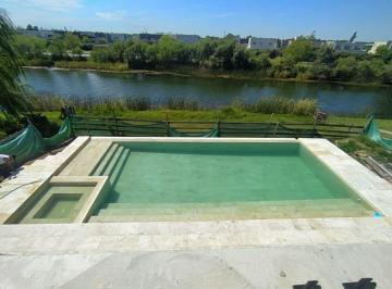 Casa · 323m² · 7 Ambientes · 4 Cocheras · Casa en Venta en Barrio Muelles, Puertos del Lago, Escobar.