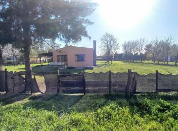 Casa · 159m² · 3 Ambientes · 1 Cochera · Terreno con Casa y Galpón en Venta - La Capilla. Florencio V