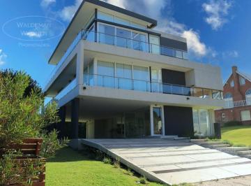 Frente · Casa a La Playa | 12 Personas | Carilo