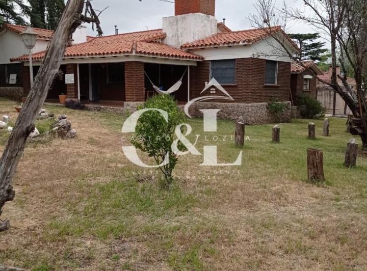 Casa · 210m² · 9 Ambientes · 1 Cochera