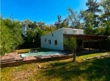 Casa · 143m² · 4 Ambientes · 4 Cocheras · En Venta en Los Cardales en El Barrio Parque Natura Casa 3 Ambientes con Piscina + Depto Monoambie