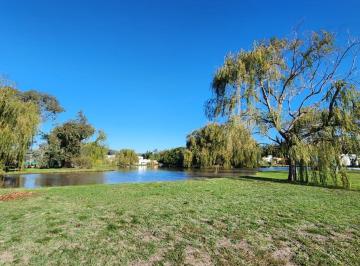 Terreno · 1350m² · Lote en Venta en Casuarinas del Pilar Club de Campo