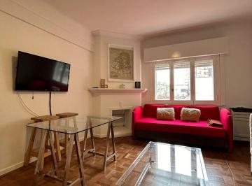 Living · Departamento en Playa Grande - 3 Ambientes
