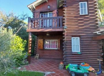 cabaña de dos plantas al fondo · Cabañas en Venta