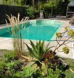 Casa · 170m² · 4 Ambientes · 1 Cochera · Casa con Piscina Sobre Dos Lotes en La Mejor Zona del Bosque Peralta Ramos