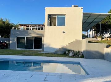 Casa · 220m² · 4 Ambientes · 1 Cochera · Casa en Venta en Tierra Alta, Carlos Paz