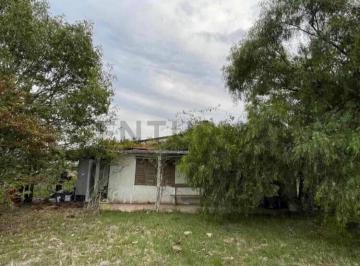 Terreno · 90m² · 2 Ambientes · Chacra con Casa y Galpón en Santa Rosa de 4 Hectáreas con Monte Nativo.