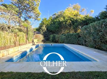 Casa de 5 ambientes, Villa Gesell · Casa en Venta de 4 Dorm., Pileta, Gas Natural! en Zona Norte