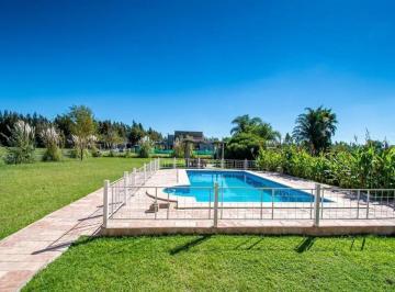 Casa · 300m² · 6 Ambientes · 4 Cocheras · Casa en Puerto Roldan