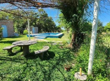 Casa · 245m² · 8 Ambientes · 1 Cochera · Oportunidad Casa Quinta en Barrio Caima en Excelente Estado