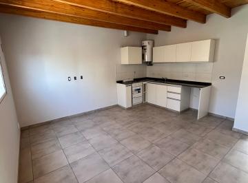 Living comedor con cocina integrada · Venta de Excelente Departamento a Estrenar