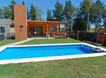 Casa · 72m² · 3 Ambientes · 1 Cochera · Venta de Casa 3 Ambientes con Jardin y Pileta en Barrio Cerrado en Los Cardales