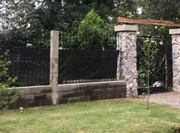 Porton de ingreso Art Nouveau · Venta Casa con Parque y Pileta