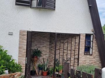 Casa · 104m² · 5 Ambientes · 1 Cochera · Casa en Venta - Villa Carlos Paz