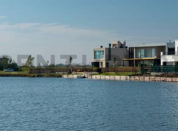 Terreno · 950m² · Lote en Venta en El Barrio Gaboto, con Fondo a Laguna 950 m²