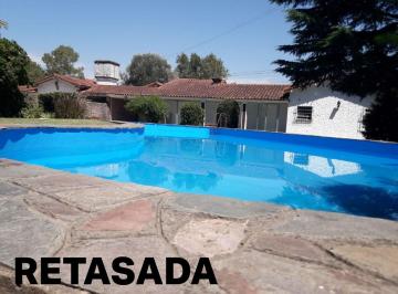 Casa · 126m² · 4 Ambientes · 1 Cochera · Quinta con Pileta.