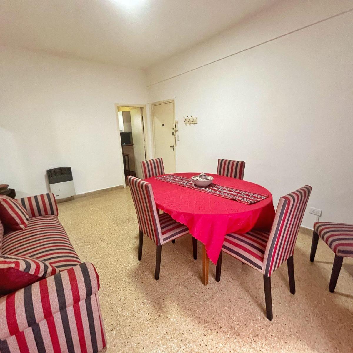 La propiedad cuenta con doble acceso, el principal es por el amplio living comedor con calefactor a gas. A su vez cuenta con dos amplias habitaciones ambas con ventanal, pisos de parquè pintados y placares empotrados.