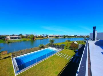 Casa · 239m² · 7 Ambientes · 2 Cocheras · Venta Casa con Pileta y Muelle Al Lago en Barrio Norte, El Cantón – Ideal Familia