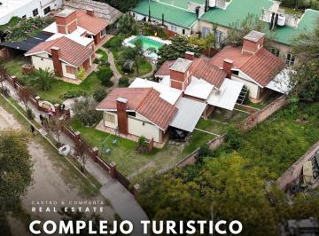 Hotel · 300m² · 15 Ambientes · Venta Complejo Turístico de 5 Cabañas con Gas Natural a m del Rio en Sol y Rio - Villa Carlos Paz