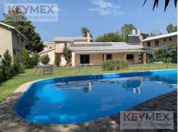 Casa · 60m² · 3 Ambientes · 1 Cochera · Casa Dúplex Venta Pilar Km 50 de 2 Dorm. con Jardin y Parrilla Seguridad Pileta