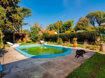 Casa · 115m² · 4 Ambientes · 2 Cocheras · Vendo Casa 3 Dorm. con Parque y Pileta en Granadero Baigorria, Barrio Los Pinos.