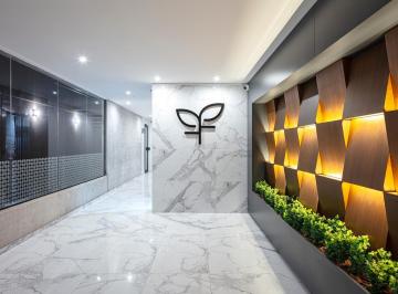 Ingreso al edificio · Departamento un Dormitorio + Comodin