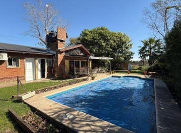 Casa · 170m² · 3 Ambientes · 1 Cochera · Venta de Casa de 2 Dorm. + Comodín en Barrio Santa Teresa, Roldán