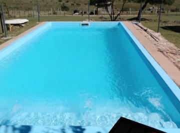 Foto · Casa con Tres Lotes en Venta