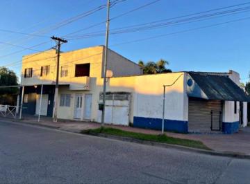 Local comercial · 273m² · 8 Ambientes · 1 Cochera · Propiedad Multifuncional en Venta: 2 Locales, 2 Departamentos y Galpón en Zárate
