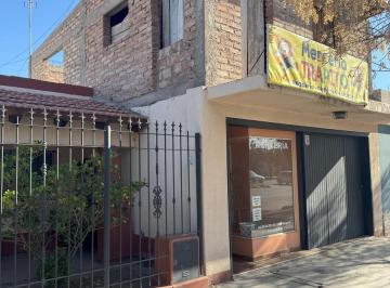 Frente (Cochera - Dpto PA - Salón comercial) · Oportunidad, Venta de Casa con Departamento y Salón Comercial