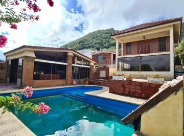 Frente · Oportunidad! Casa + Departamento con Amenities en Villa Carlos Paz