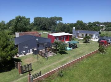 Casa · 148m² · 7 Ambientes · Complejo de 3 Cabañas en Venta Parque Lago - Permuta por Depto en Mdp