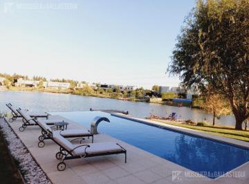 Casa · 350m² · 5 Ambientes · 6 Cocheras · Casa en San Benito con Lote de 1500 m con 70 m de Costa Sobre Laguna.4 Dorm..