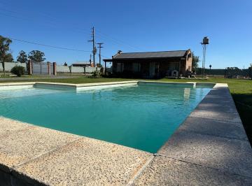 Casa · 110m² · 2 Ambientes · 7 Cocheras · Casa con Gran Lote y Pileta