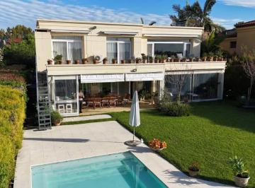 Casa · 391m² · 7 Ambientes · 4 Cocheras · Casa con 6 Dorm. en Venta con Lote a La Laguna Central Barrio Santa Bárbara