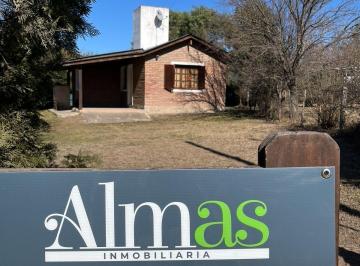 frente · Oportunidad: Casa de 2 Dorm. con Amplio Jardín, Amoblada y Escritura Inmediata