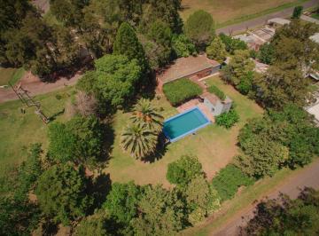 Casa · 200m² · 6 Ambientes · 1 Cochera · Casa en Venta con Pileta Sobre Ruta 18 2143 m² de Terreno Acepta Permuta