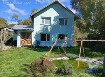 Casa · 200m² · 5 Ambientes · 1 Cochera · Casa con Cabaña Sobre Amplio Lote en Bº Pájaro Azul – Km 11 Av Bustillo