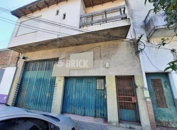 Terreno · 566m² · Lote de 8.66x49 m en Bouchard Al 3200 - 424 m² de Superficie - Hoy Galpon y Oficina y PH
