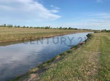 Terreno · 1000m² · 5 Cocheras · Lote Premium con Vista Al Canal en Haras del Sur III - Las Araucarias. Acepta Permuta por Vehículo.