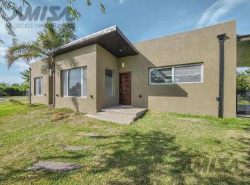 Casa · 97m² · 4 Ambientes · 1 Cochera · Casa en Puerto Roldan