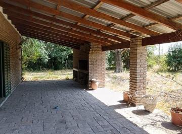 Casa · 82m² · 4 Ambientes · 2 Cocheras · Venta Casa en Pueblo Esther con Terreno de 2100 m²