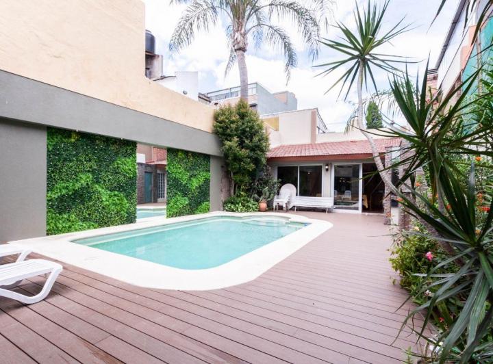 Casa · 400m² · 6 Ambientes · 1 Cochera