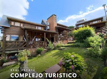 Hotel · 330m² · 7 Dormitorios · 3 Cocheras · Venta Complejo de 3 Cabañas y Departamento Equipados a 200 m del Rio en San Antonio de Arredondo