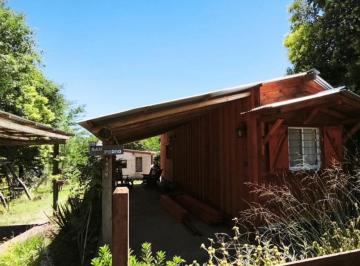 Casa · 72m² · 2 Ambientes · Venta de Casa Container con Quincho Cerrado en Villa Ciudad Parque - Calamuchita. con Escritura