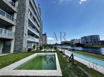 Departamento · 99m² · 3 Ambientes · 1 Cochera · Departamento en Venta, 3 Amb. con Jardín y Piscina con Vista Al Lago Central. Edificio Yoo Nordelta